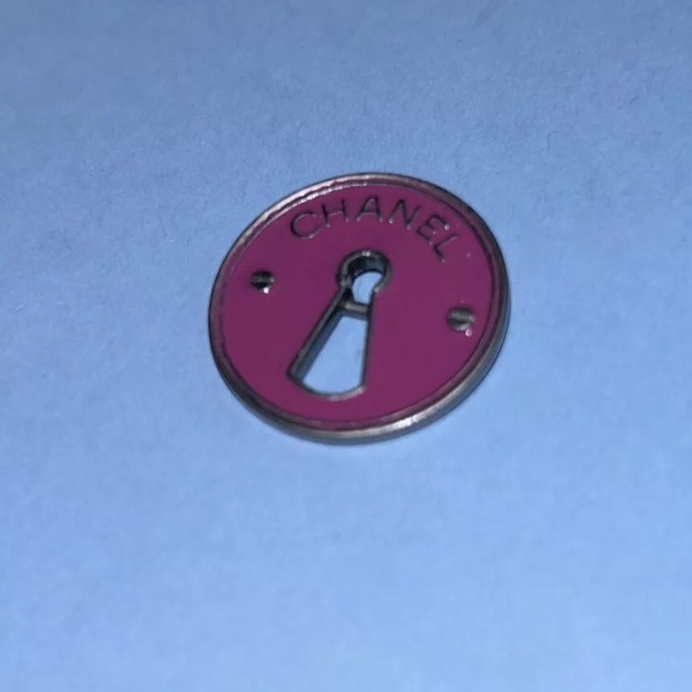 100% Authentic Chanel keyhole button magenta
